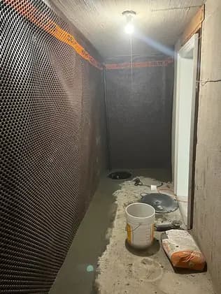 Interior waterproofing drain system installed by DrySpace