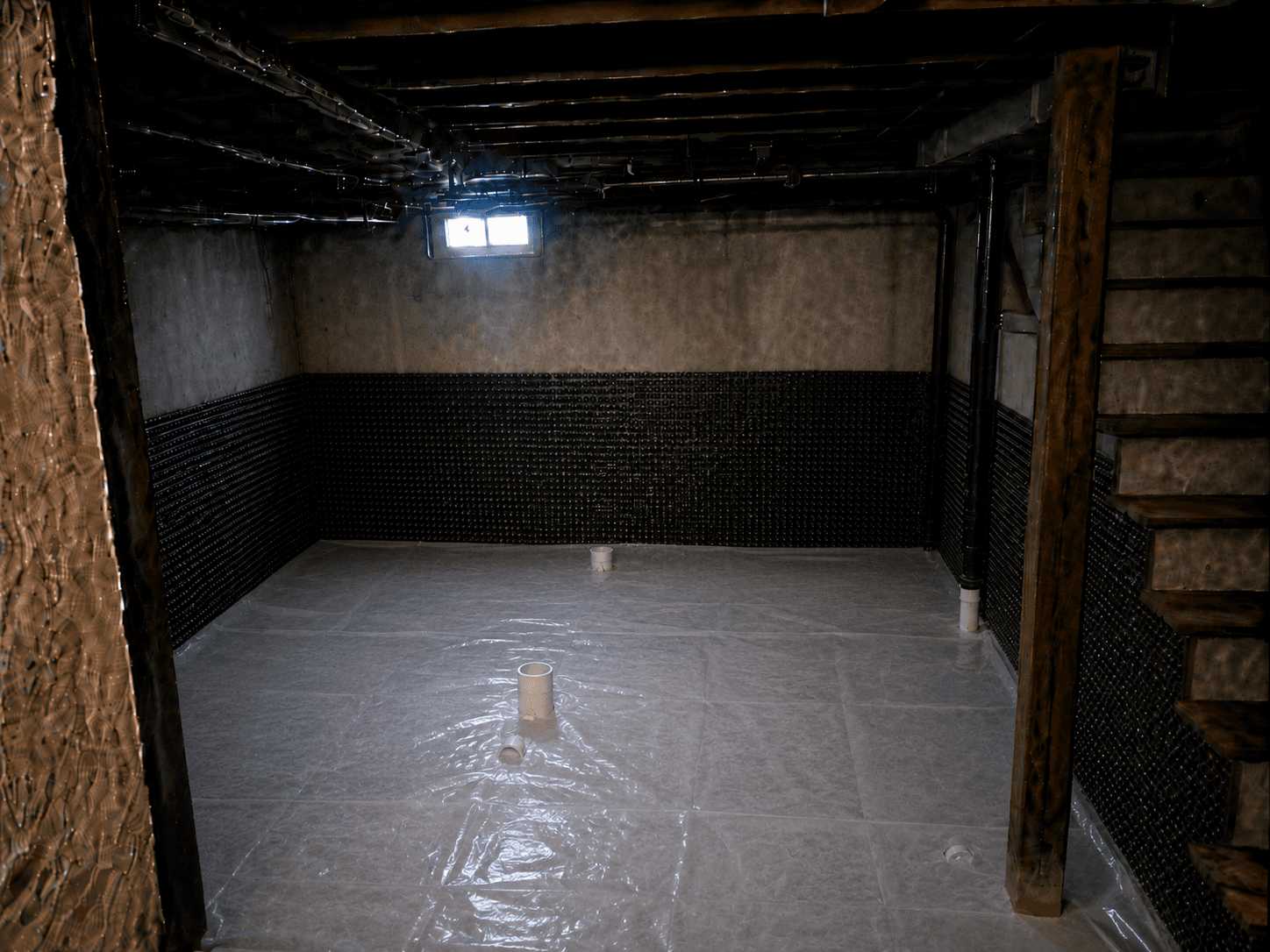 6 mil polyethylene vapor and radon barrier installed